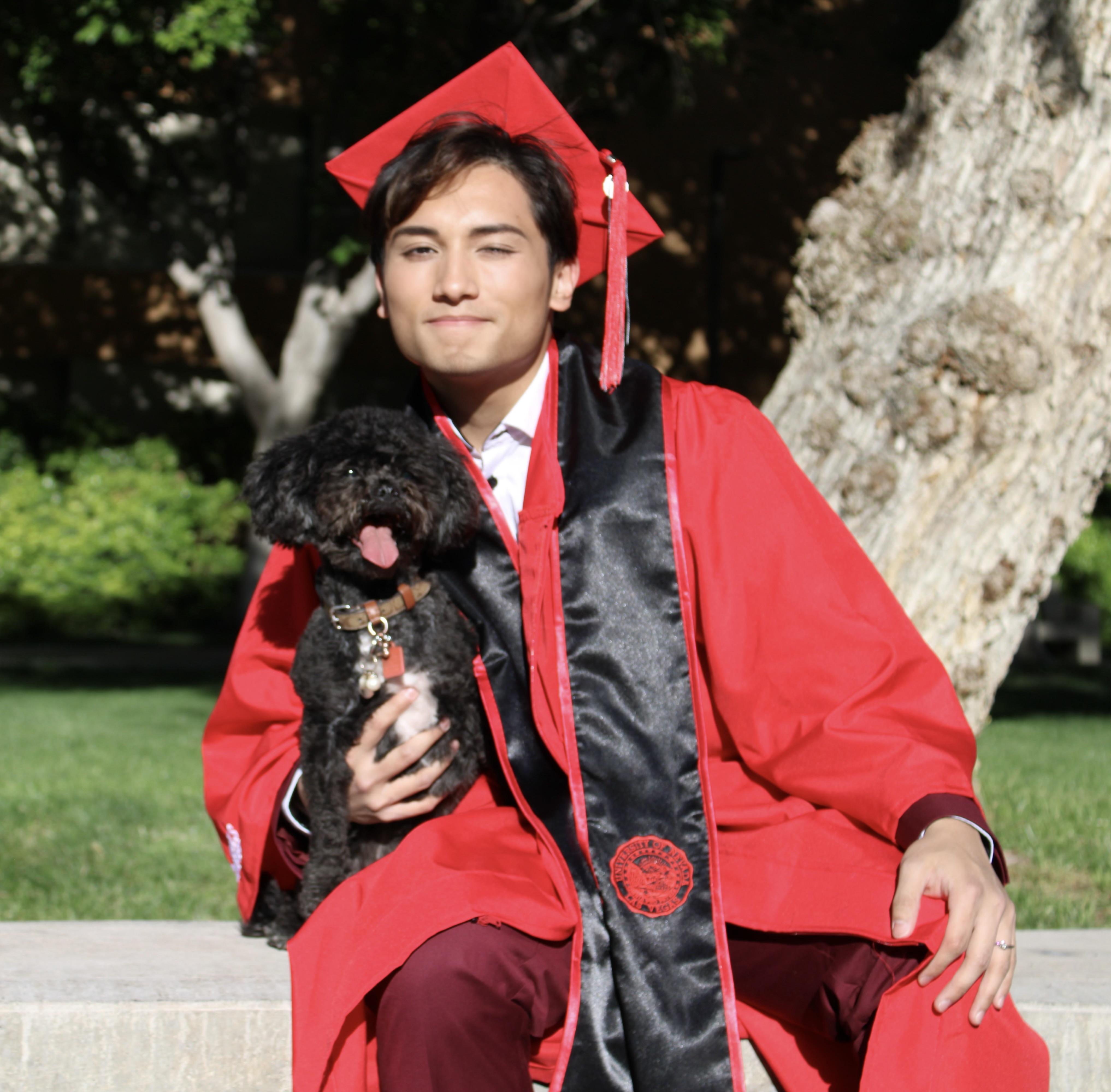 Commencement image of Mark Jayson Farol with a cap and gown.
